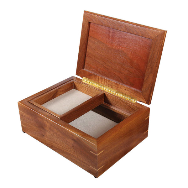 Handcrafted wooden jewelry box with a tray compartment.